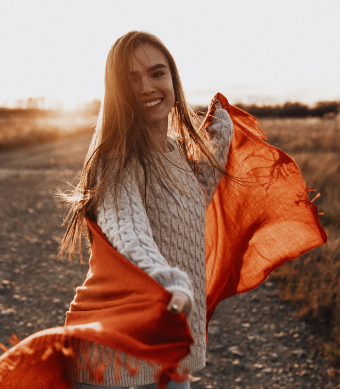 a happy woman after Therapy for Emotional Abuse