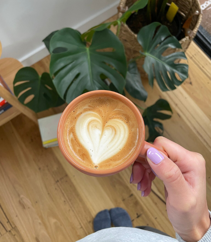 cup of coffee with heart in foam