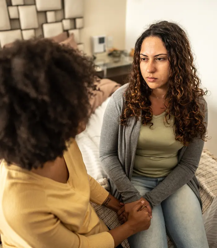 Two women talking during a supportive therapy counseling session
