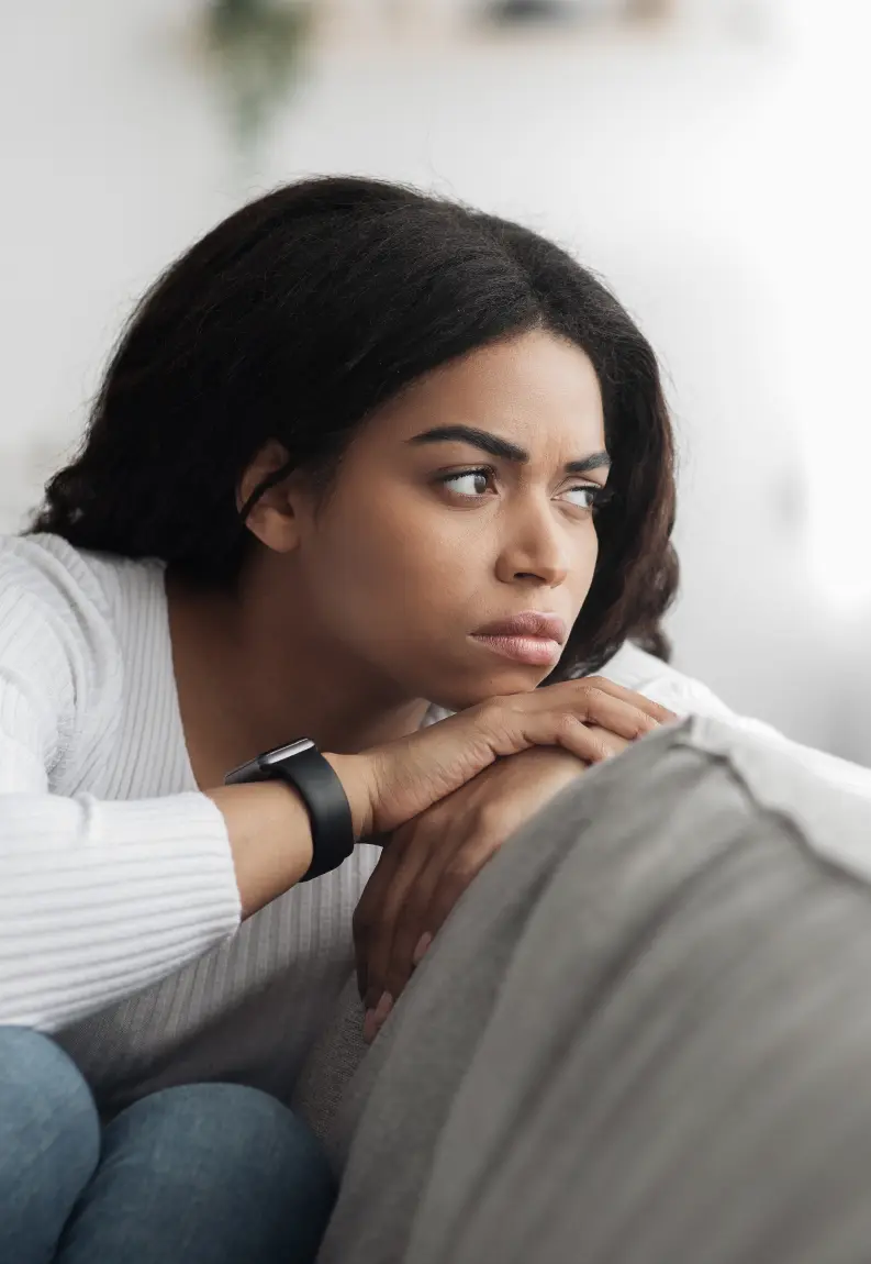 Person working through betrayal and rebuilding trust in their own perception during therapy