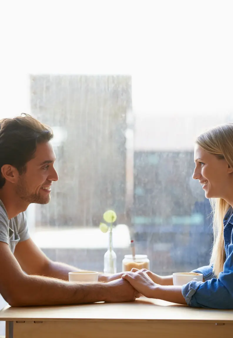 Person discussing a difficult experience with a therapist during a therapeutic disclosure session